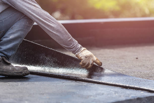 Professional Exterior Waterproofing technician working in Pewamo, MI